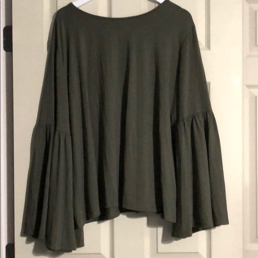 Hunter green top with bell sleeves. NWOT.